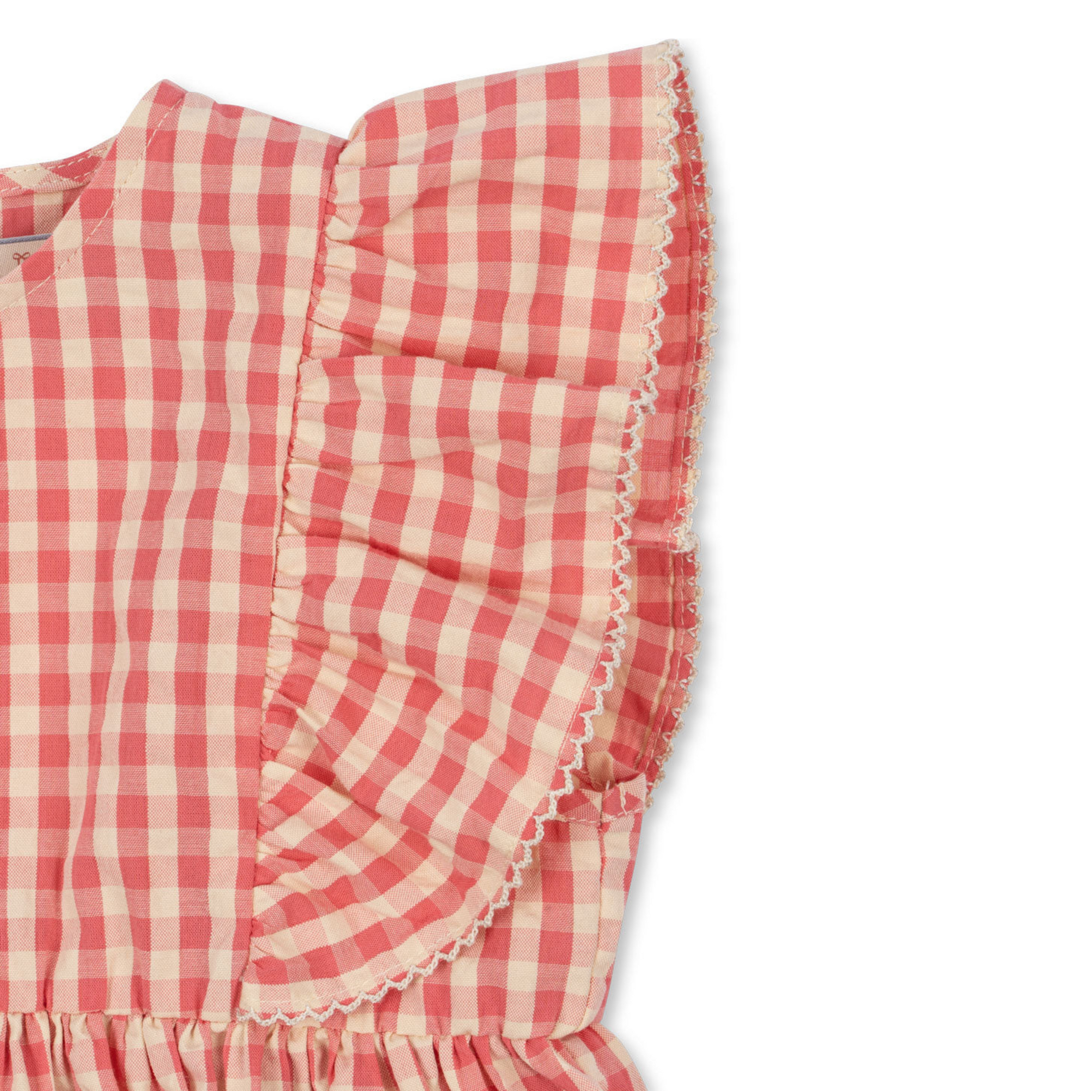 Girls pink plaid dress with ruffles