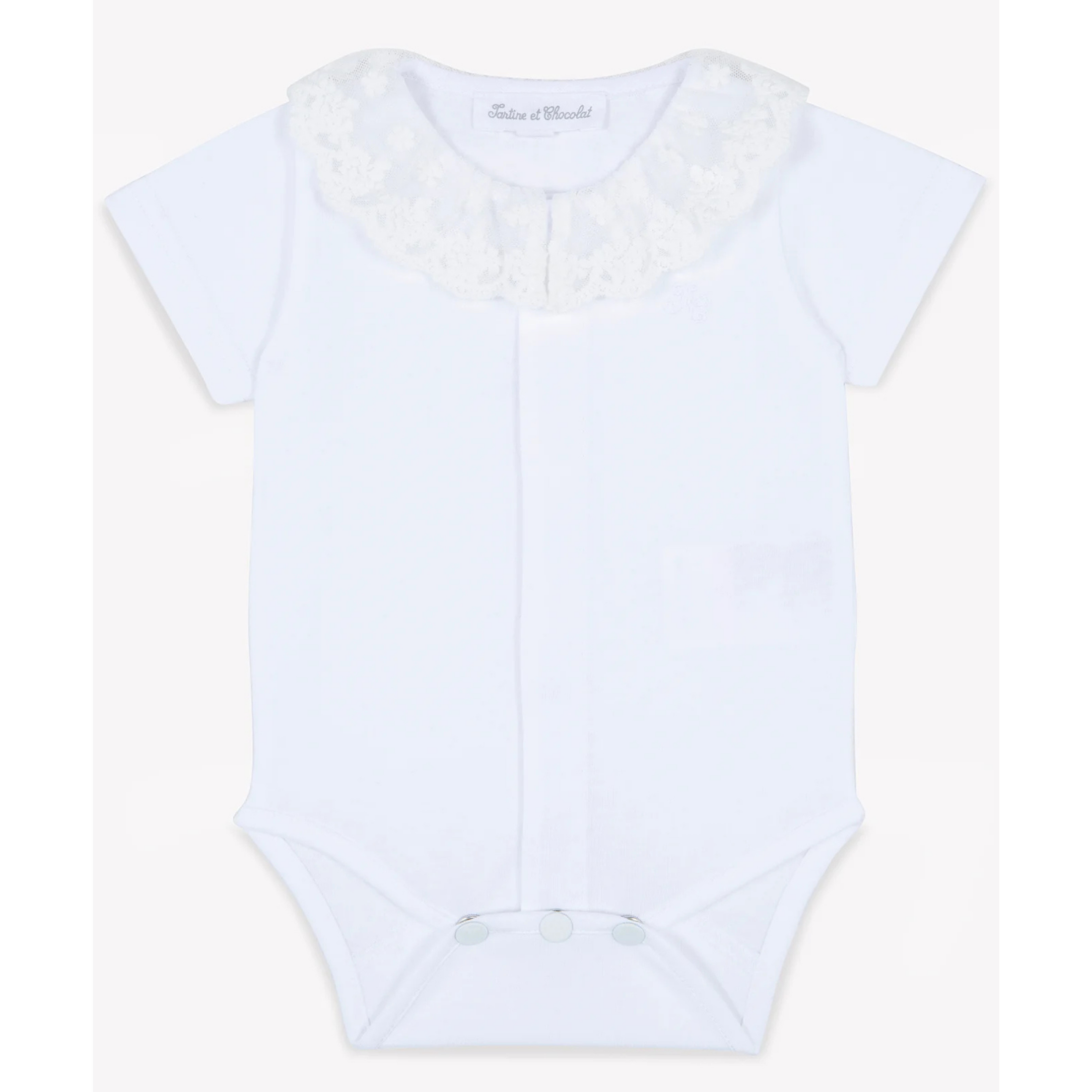 White baby jumpsuit with ruffle collar