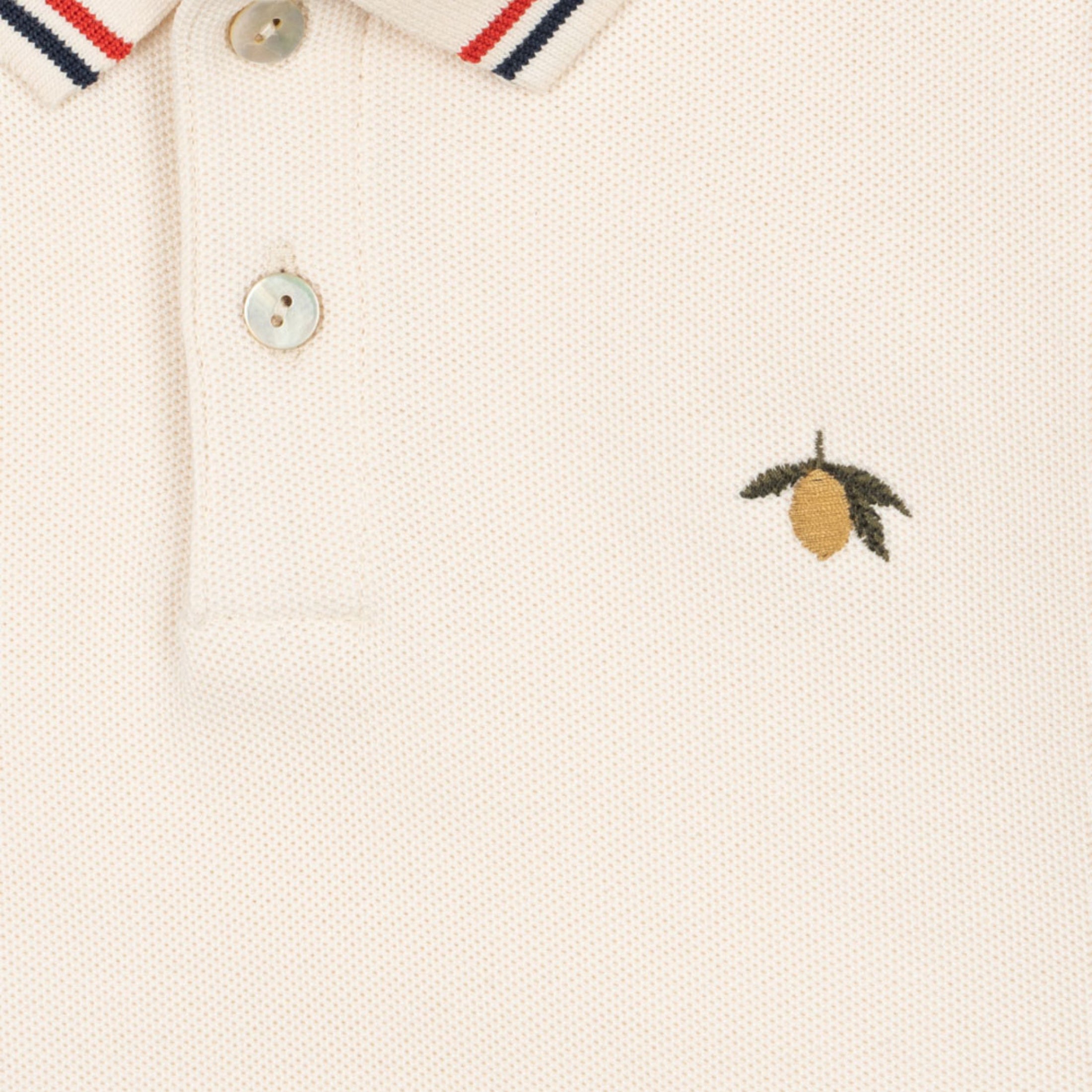 Βρεφική μπλούζα polo μπεζ με σχέδιο λεμόνι Konges Slojd