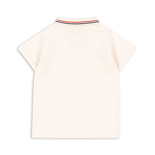 Βρεφική μπλούζα polo μπεζ με σχέδιο λεμόνι Konges Slojd