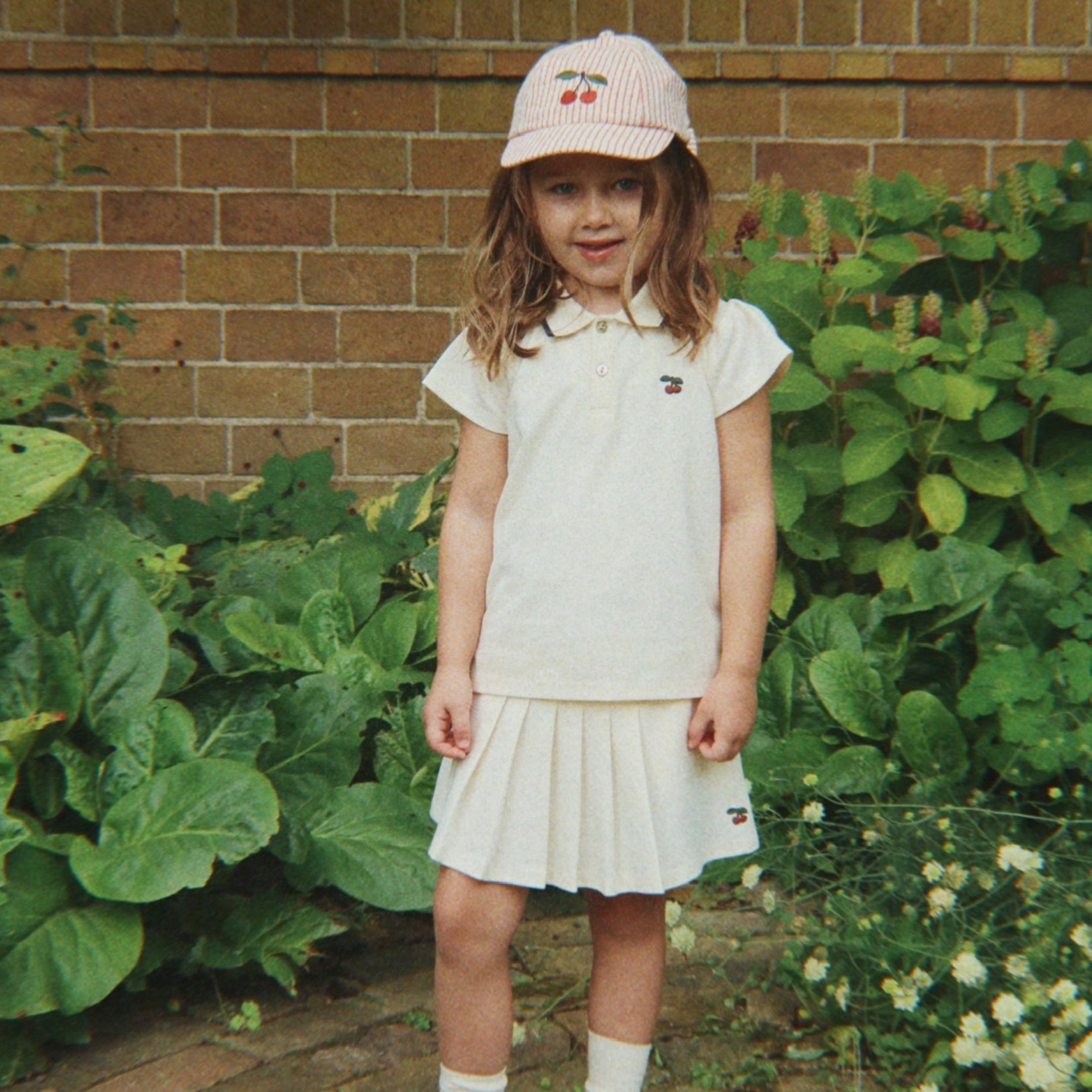 Βρεφικό καπέλο Jockey ριγέ με κερασάκι Ellie Konges Slojd