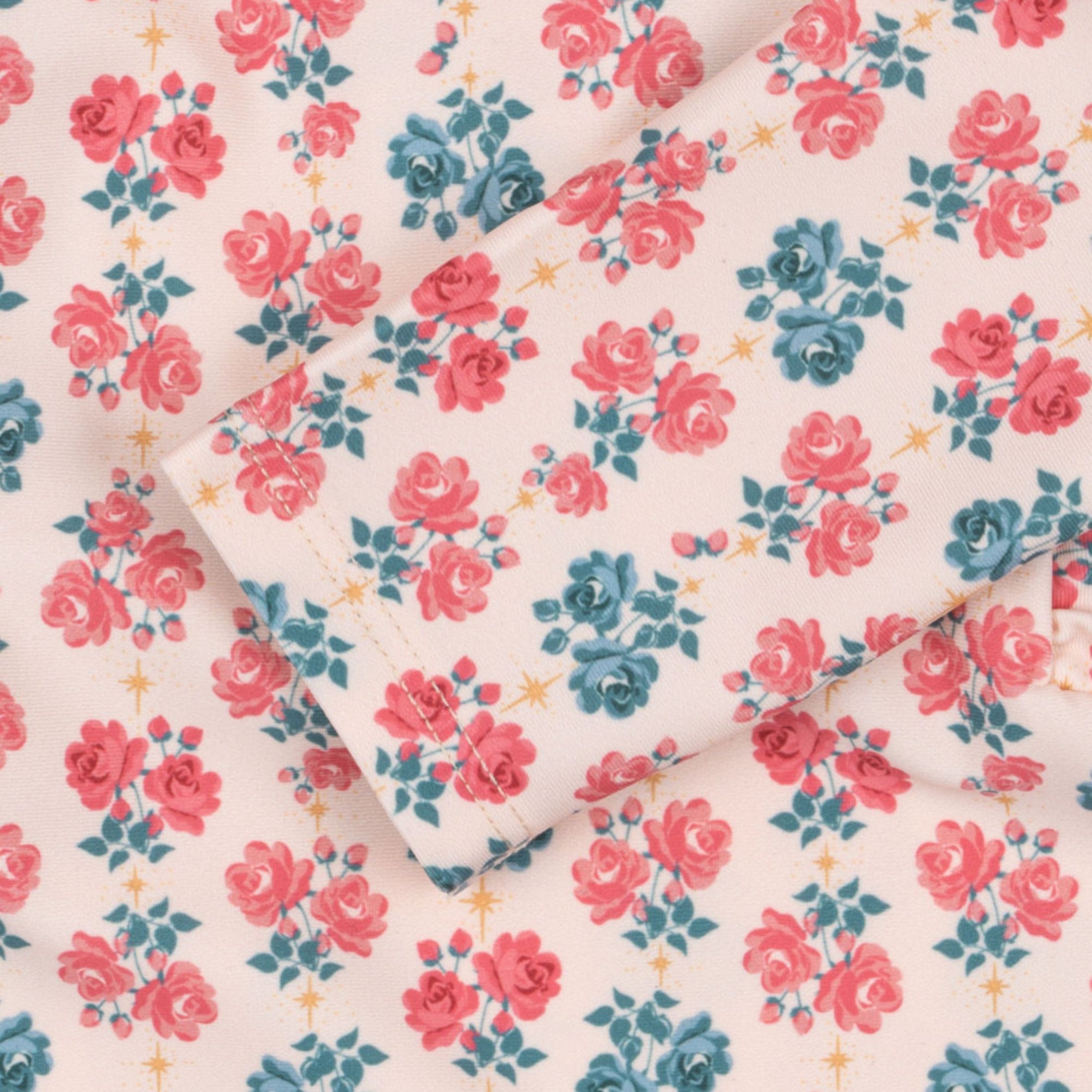 Βρεφικό ολόσωμο μαγιό floral με βολάν Konges Slojd