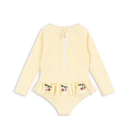 Βρεφικό ολόσωμο μαγιό καρό UV40 με βολάν & κερασάκια Konges Slojd