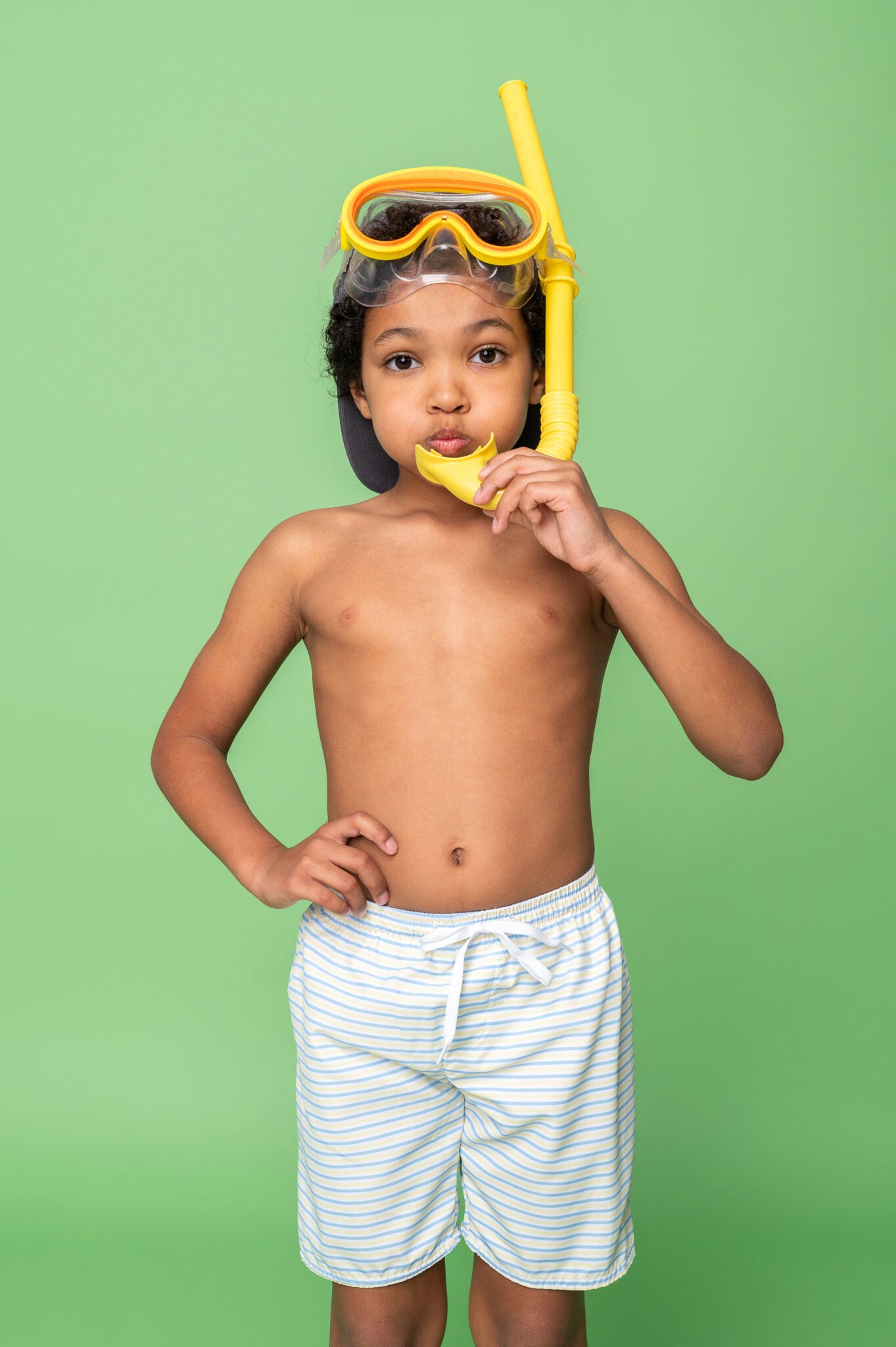 Boys swimsuit shorts with yellow and blue stripes