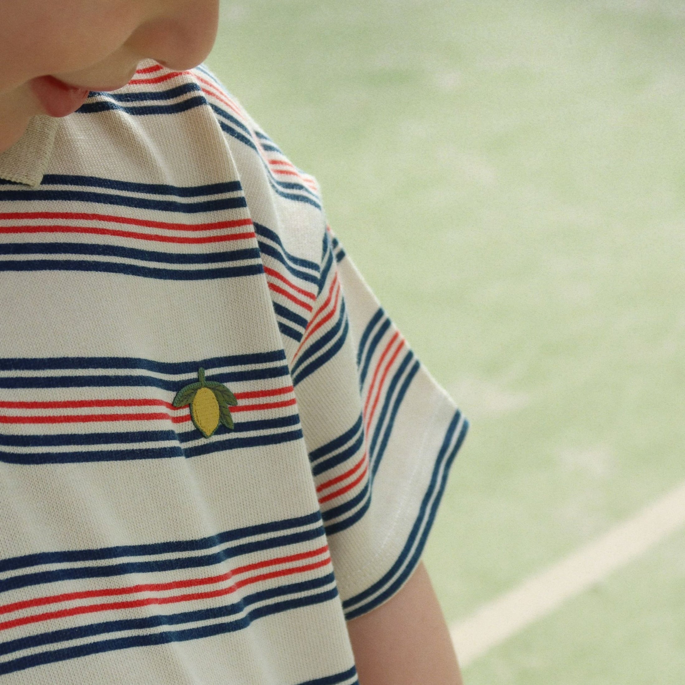 Παιδική μπλούζα πόλο ριγέ με σχέδιο λεμόνι Konges Slojd